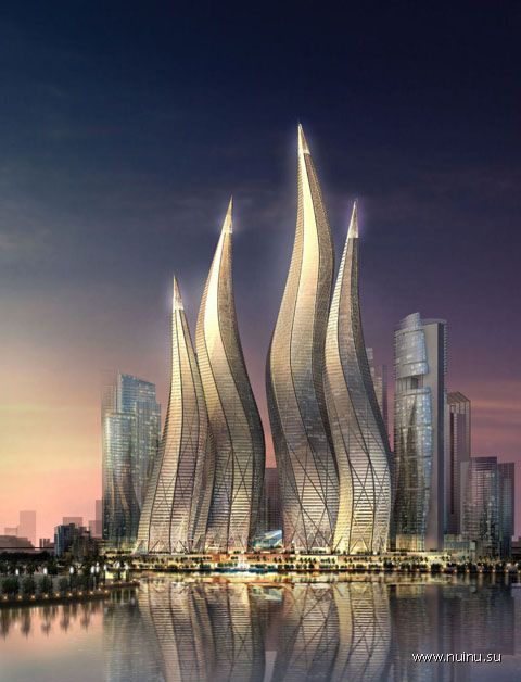 Башни в форме горящих свечей в Дубаи (3 фото)